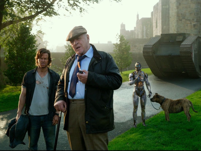 Cade Yeager and Sir Edmund Burton discuss things with Cogman and Burton's dog