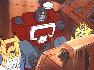 Perceptor talking to Bumblebee and Seaspray while working on the computer