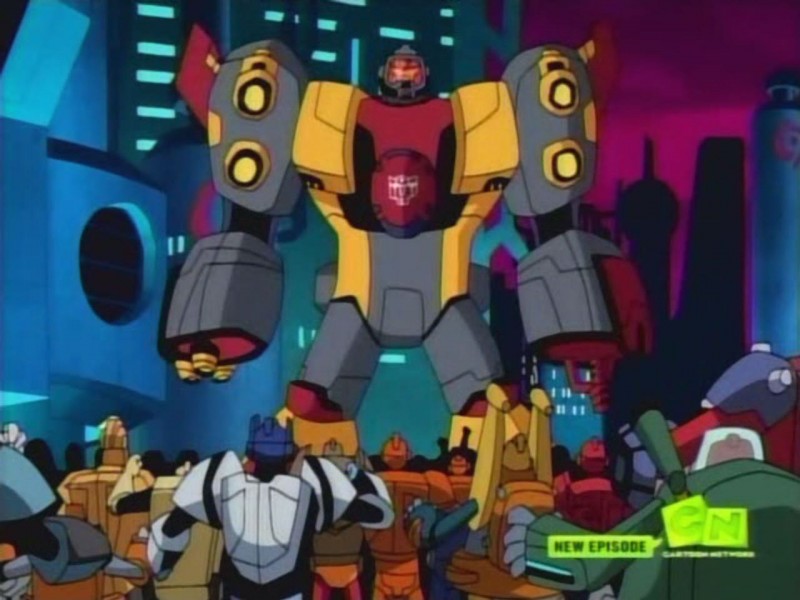 Omega Supreme stands before Autobots